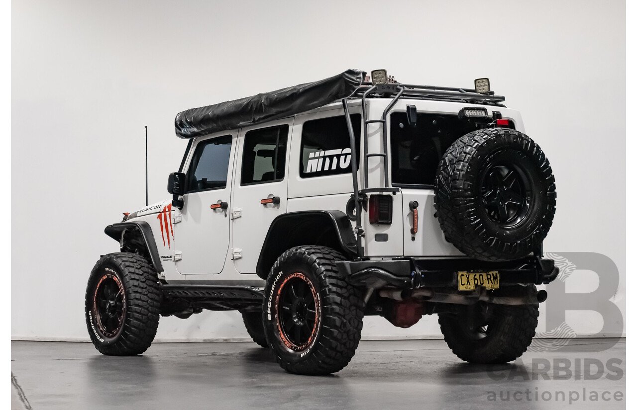 3/2011 Jeep Wrangler Unlimited Rubicon (4x4) JK MY11 4d Softtop White 3.8L - Modified