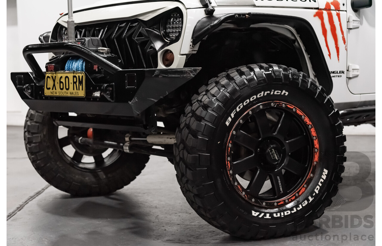 3/2011 Jeep Wrangler Unlimited Rubicon (4x4) JK MY11 4d Softtop White 3.8L - Modified