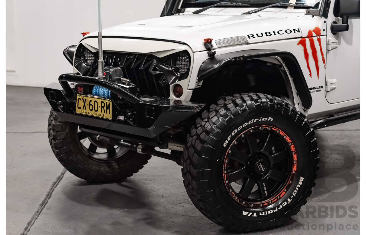 3/2011 Jeep Wrangler Unlimited Rubicon (4x4) JK MY11 4d Softtop White 3.8L - Modified