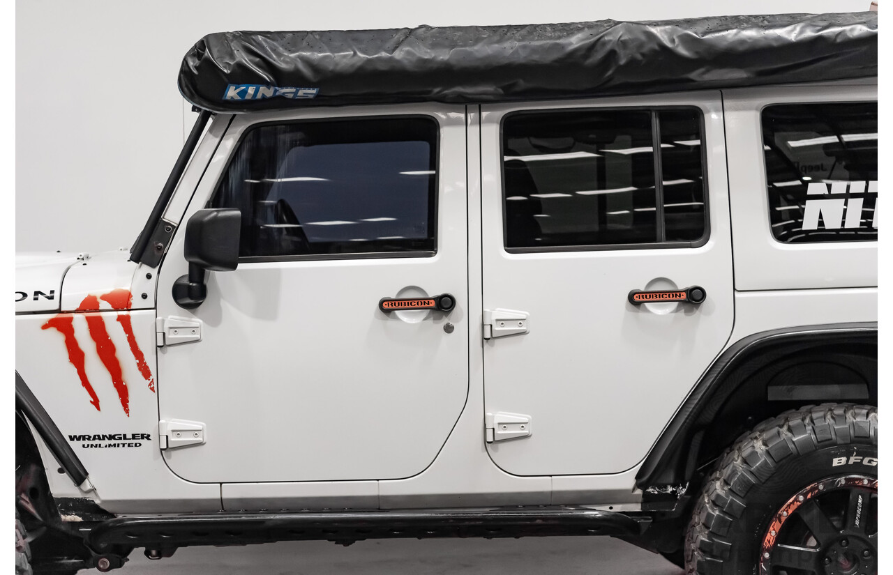 3/2011 Jeep Wrangler Unlimited Rubicon (4x4) JK MY11 4d Softtop White 3.8L - Modified