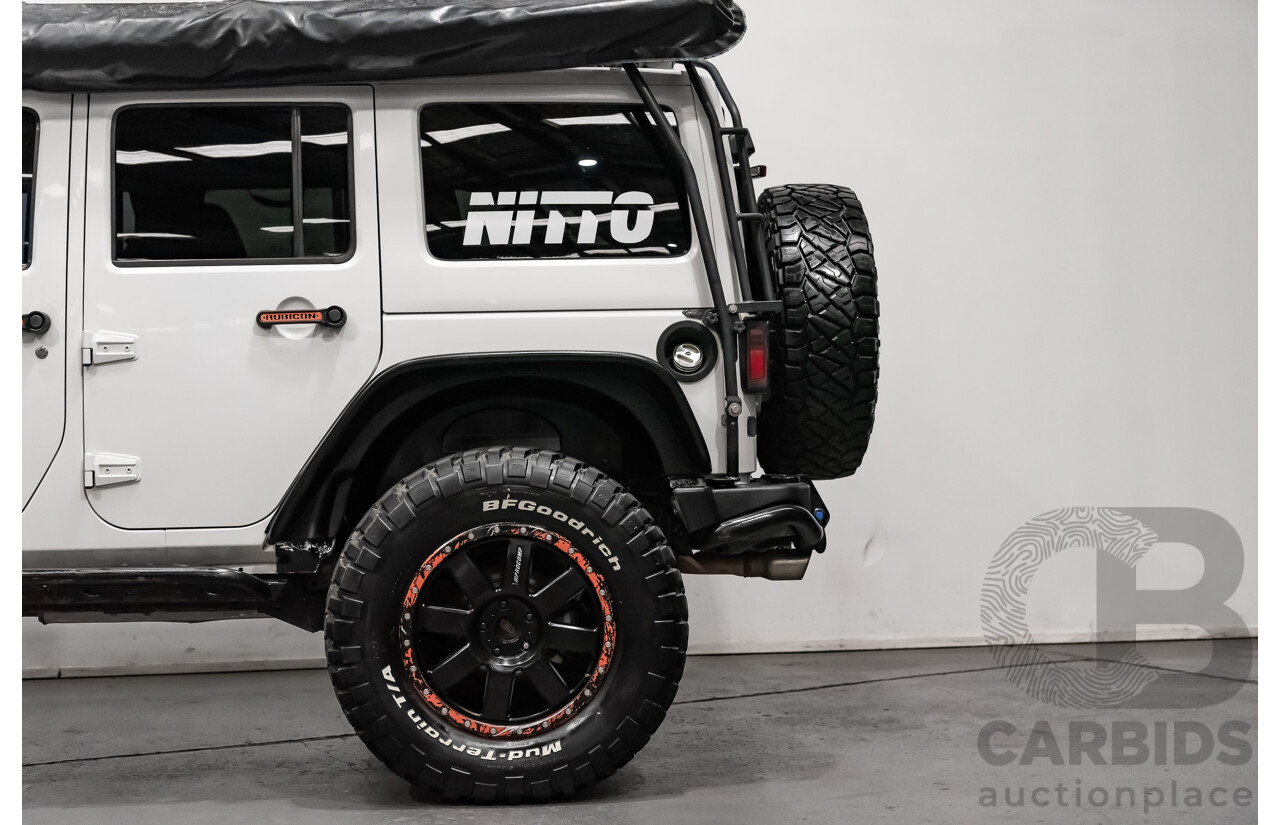 3/2011 Jeep Wrangler Unlimited Rubicon (4x4) JK MY11 4d Softtop White 3.8L - Modified