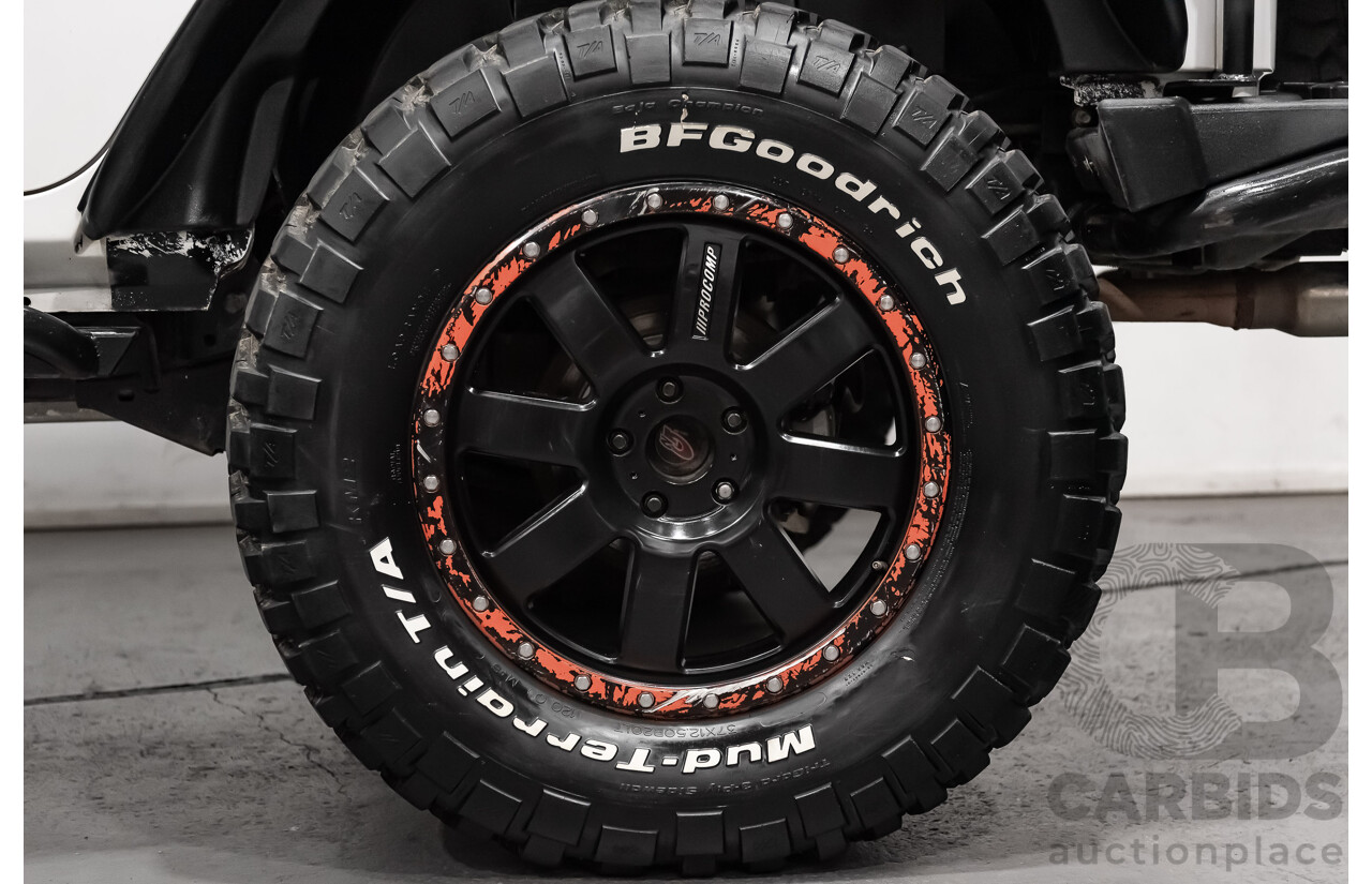 3/2011 Jeep Wrangler Unlimited Rubicon (4x4) JK MY11 4d Softtop White 3.8L - Modified