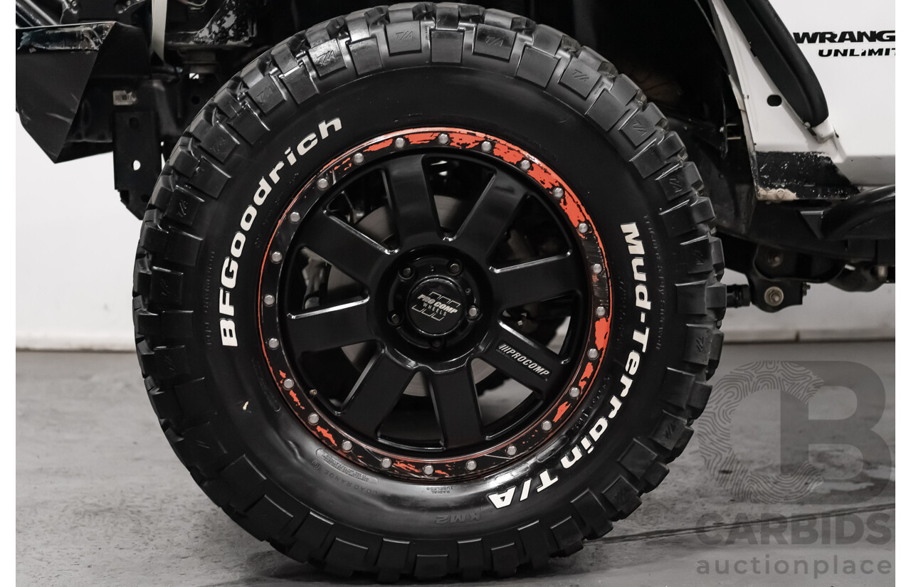 3/2011 Jeep Wrangler Unlimited Rubicon (4x4) JK MY11 4d Softtop White 3.8L - Modified