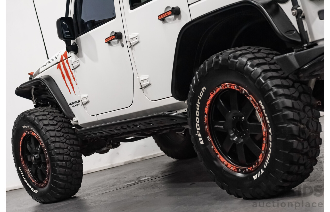 3/2011 Jeep Wrangler Unlimited Rubicon (4x4) JK MY11 4d Softtop White 3.8L - Modified