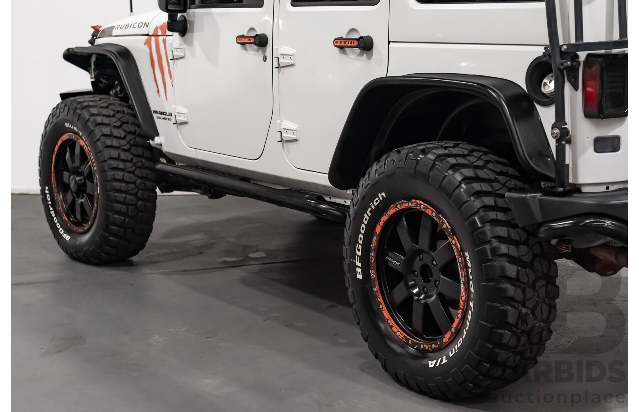 3/2011 Jeep Wrangler Unlimited Rubicon (4x4) JK MY11 4d Softtop White 3.8L - Modified