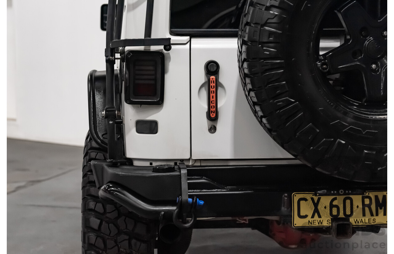 3/2011 Jeep Wrangler Unlimited Rubicon (4x4) JK MY11 4d Softtop White 3.8L - Modified