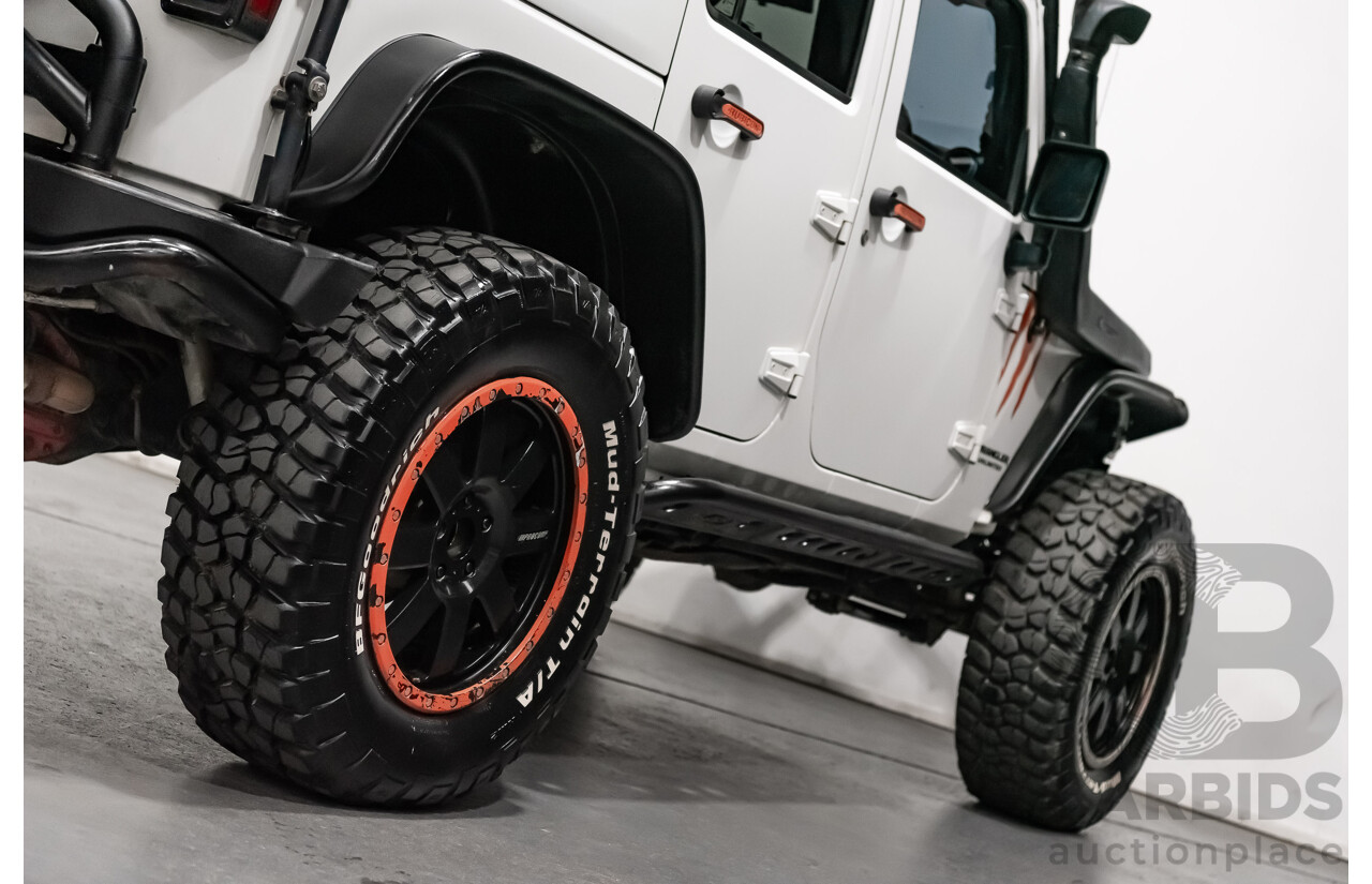 3/2011 Jeep Wrangler Unlimited Rubicon (4x4) JK MY11 4d Softtop White 3.8L - Modified