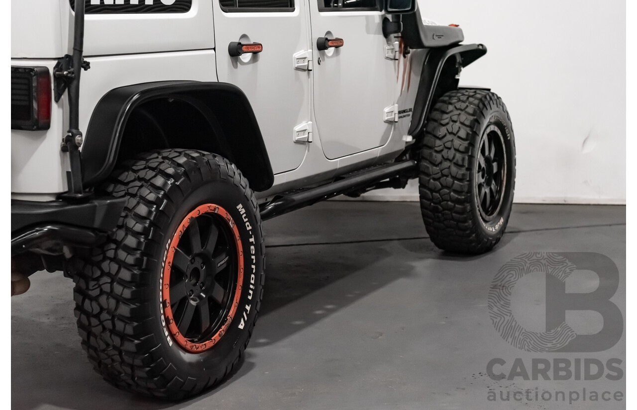 3/2011 Jeep Wrangler Unlimited Rubicon (4x4) JK MY11 4d Softtop White 3.8L - Modified