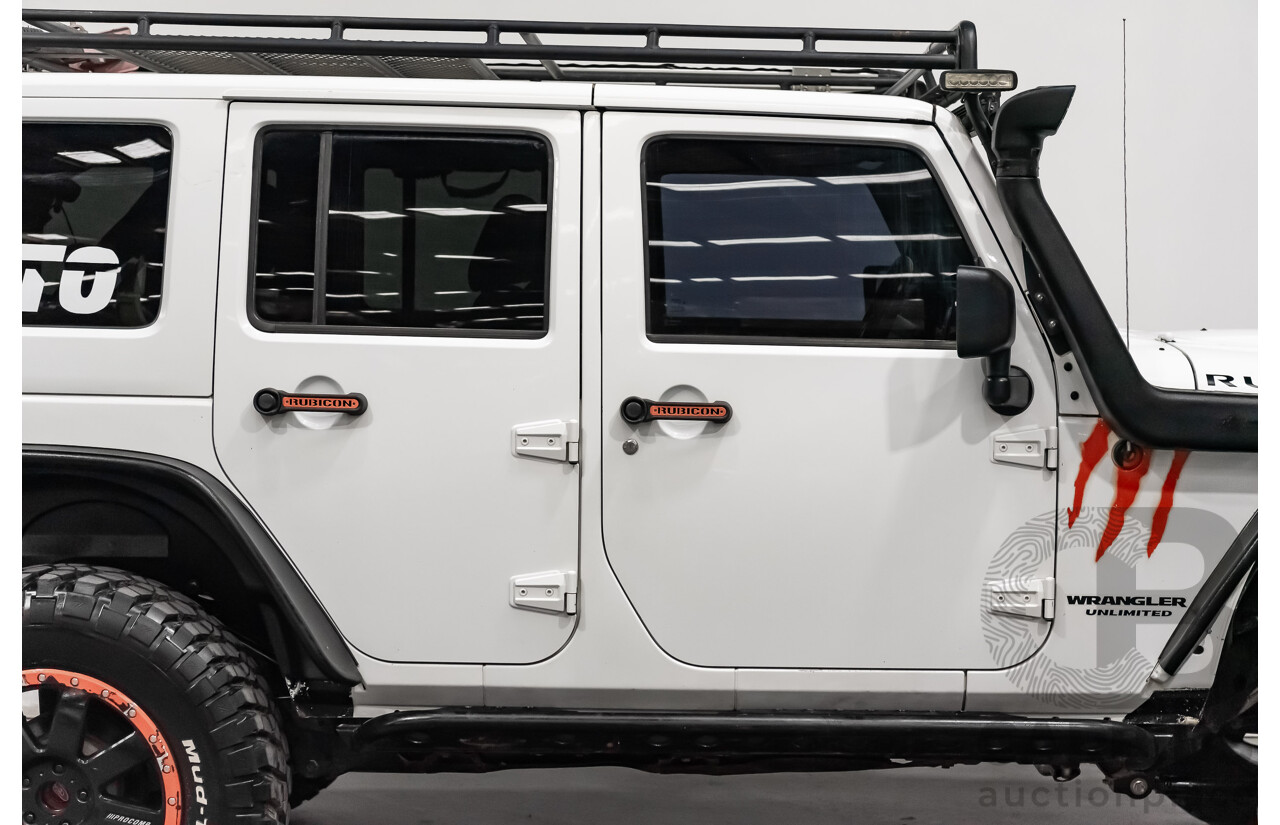 3/2011 Jeep Wrangler Unlimited Rubicon (4x4) JK MY11 4d Softtop White 3.8L - Modified