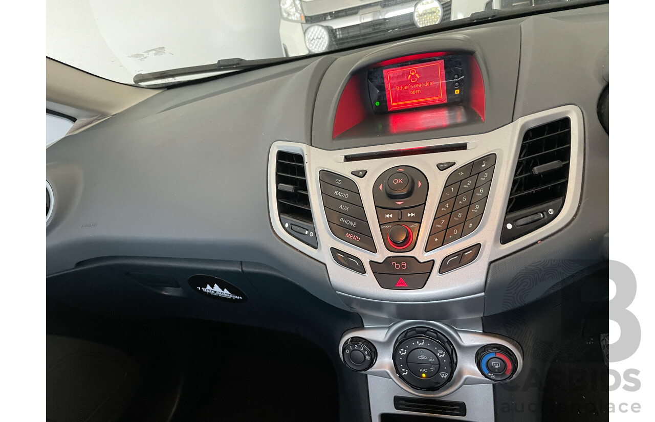 7/2012 Ford Fiesta CL WT 5d Hatchback Black 1.6L