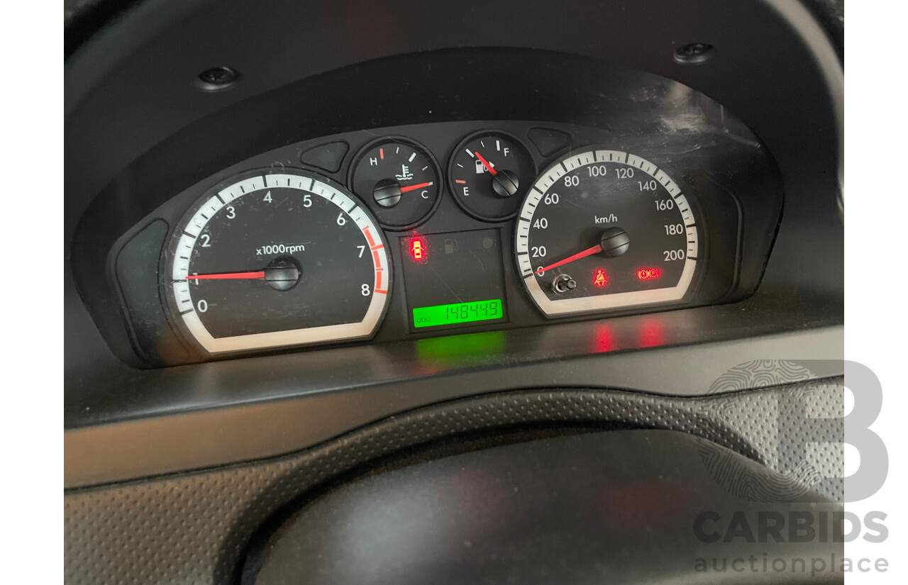 06/09 Holden Barina  FWD TK MY09 3D Hatchback Red 1.6L