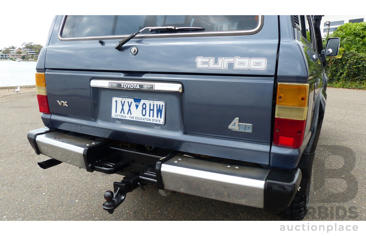 1/1986 Toyota Landcruiser Sahara (4x4) HJ61RG 4d Wagon Blue Diesel 4.0L