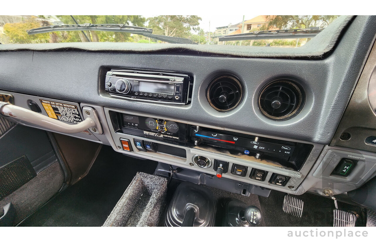 1/1986 Toyota Landcruiser Sahara (4x4) HJ61RG 4d Wagon Blue Diesel 4.0L