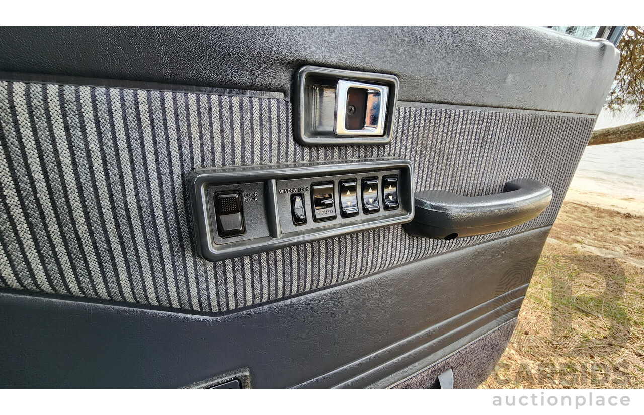 1/1986 Toyota Landcruiser Sahara (4x4) HJ61RG 4d Wagon Blue Diesel 4.0L