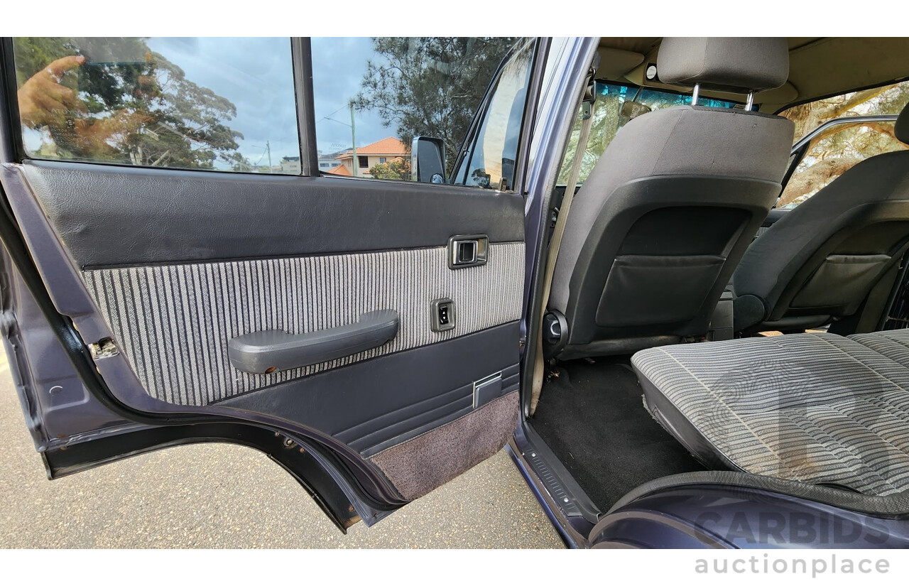 1/1986 Toyota Landcruiser Sahara (4x4) HJ61RG 4d Wagon Blue Diesel 4.0L