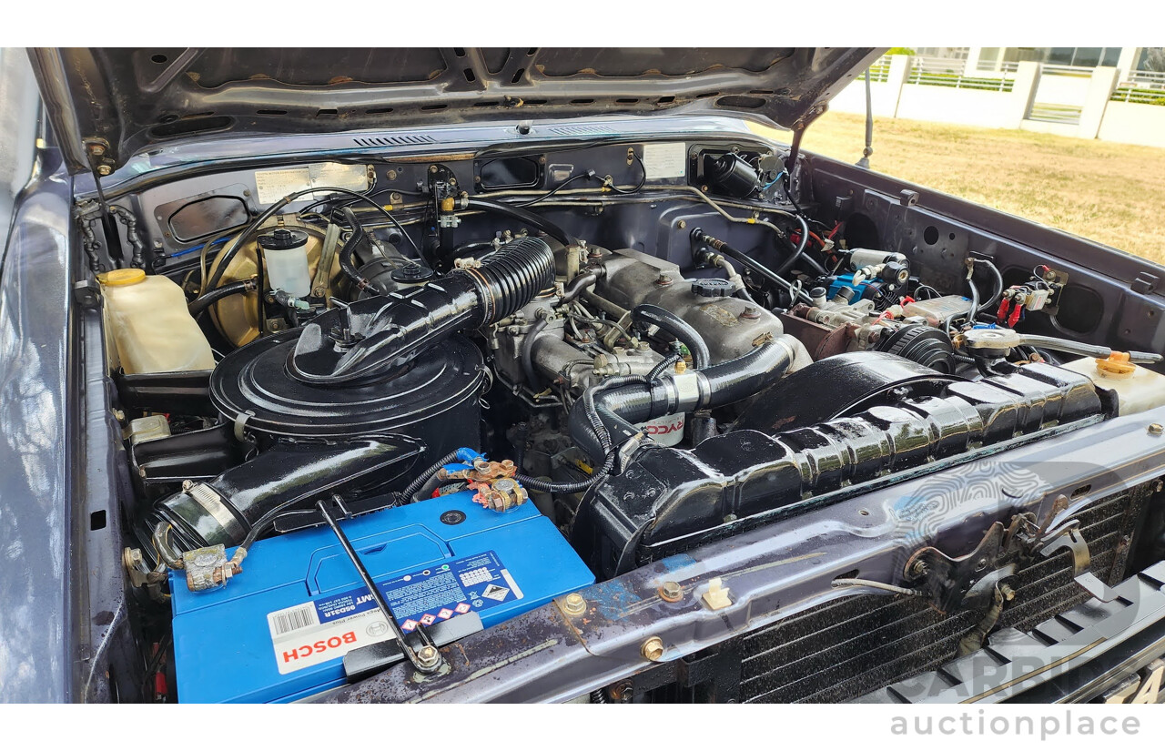 1/1986 Toyota Landcruiser Sahara (4x4) HJ61RG 4d Wagon Blue Diesel 4.0L