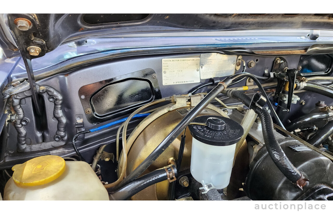 1/1986 Toyota Landcruiser Sahara (4x4) HJ61RG 4d Wagon Blue Diesel 4.0L