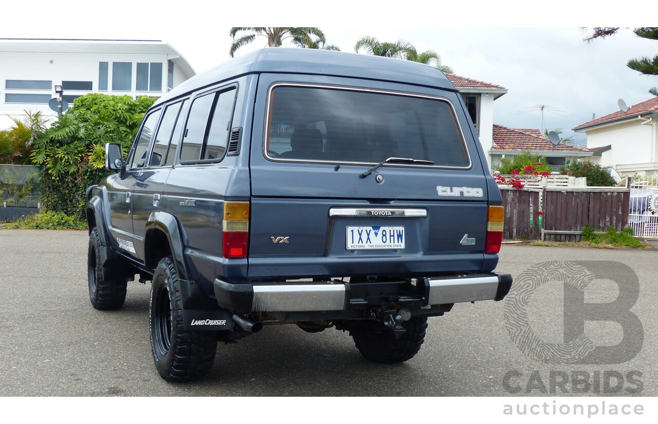 1/1986 Toyota Landcruiser Sahara (4x4) HJ61RG 4d Wagon Blue Diesel 4.0L