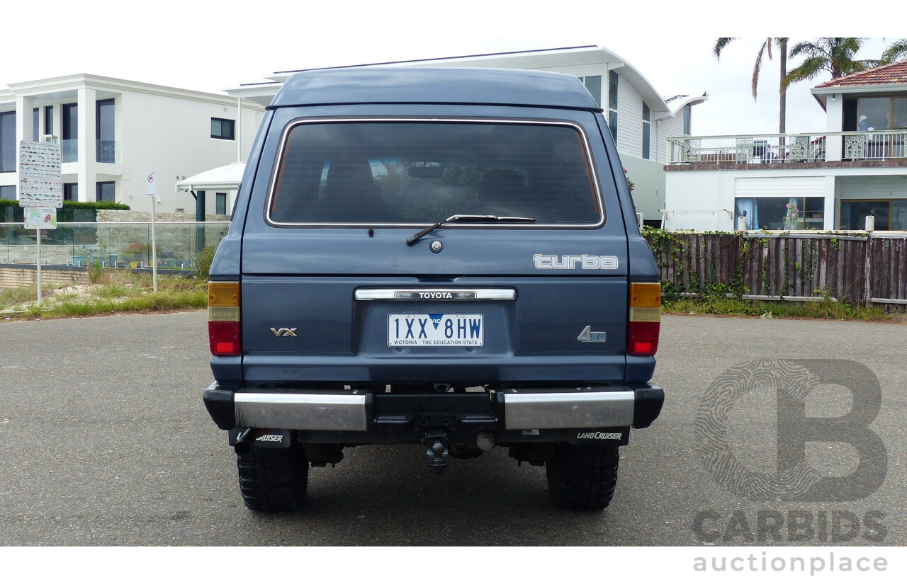 1/1986 Toyota Landcruiser Sahara (4x4) HJ61RG 4d Wagon Blue Diesel 4.0L