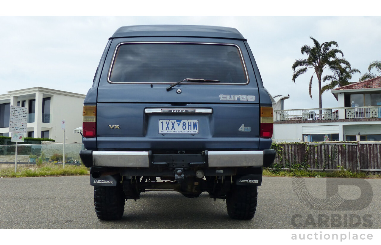 1/1986 Toyota Landcruiser Sahara (4x4) HJ61RG 4d Wagon Blue Diesel 4.0L