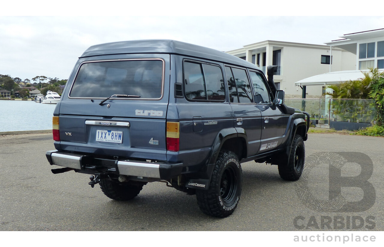 1/1986 Toyota Landcruiser Sahara (4x4) HJ61RG 4d Wagon Blue Diesel 4.0L