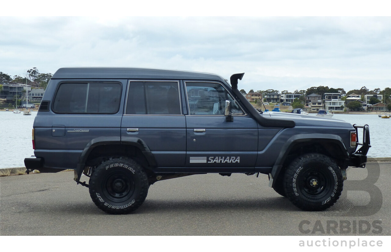 1/1986 Toyota Landcruiser Sahara (4x4) HJ61RG 4d Wagon Blue Diesel 4.0L