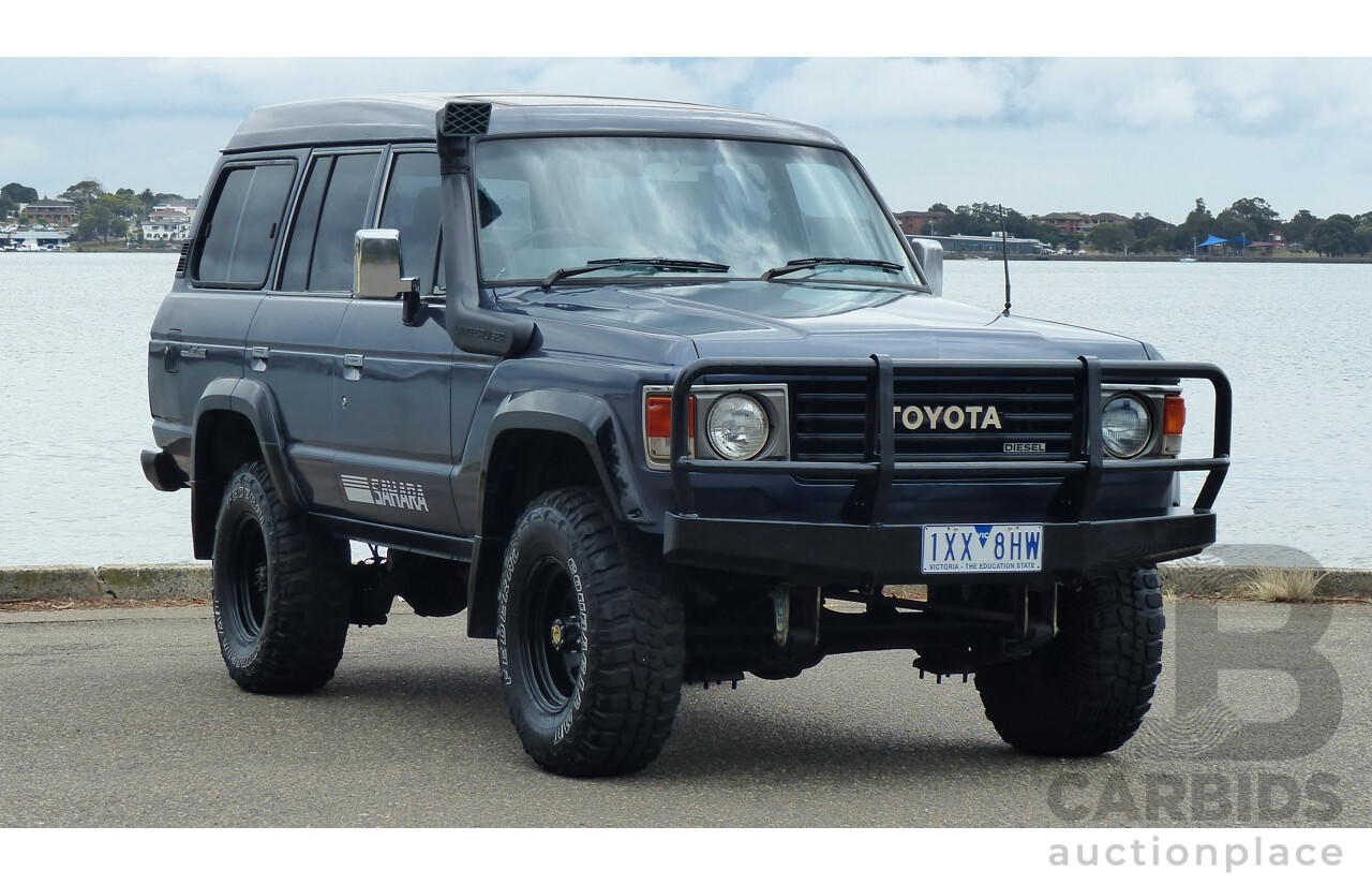 1/1986 Toyota Landcruiser Sahara (4x4) HJ61RG 4d Wagon Blue Diesel 4.0L