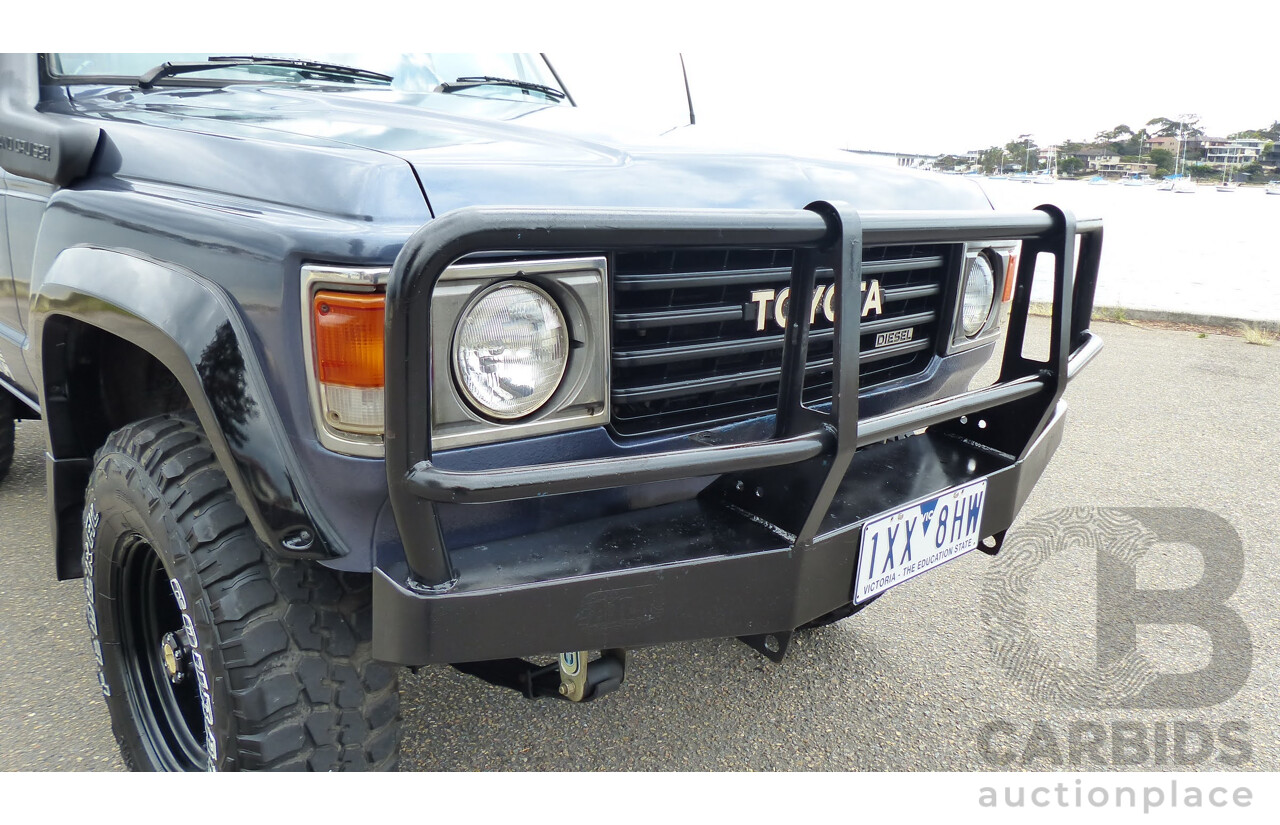 1/1986 Toyota Landcruiser Sahara (4x4) HJ61RG 4d Wagon Blue Diesel 4.0L