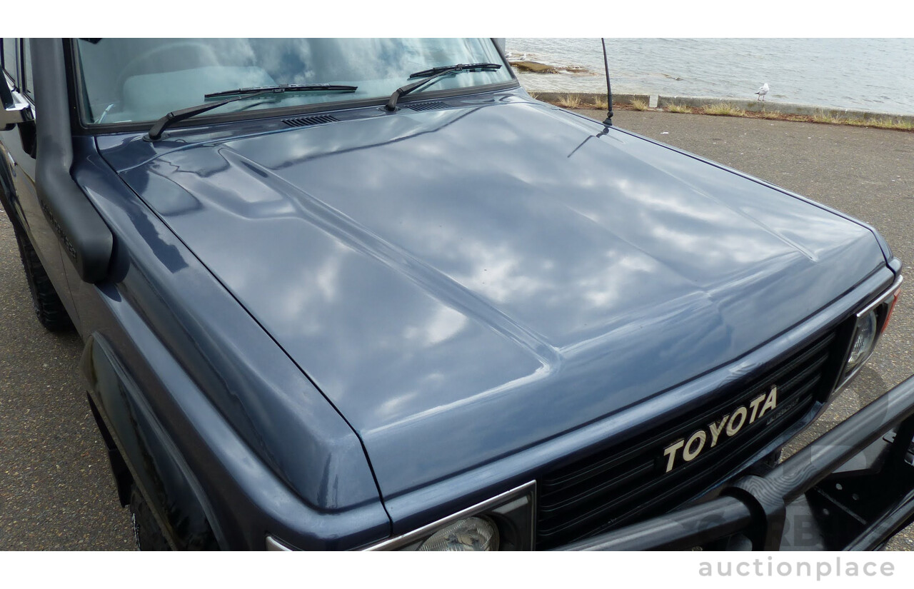 1/1986 Toyota Landcruiser Sahara (4x4) HJ61RG 4d Wagon Blue Diesel 4.0L