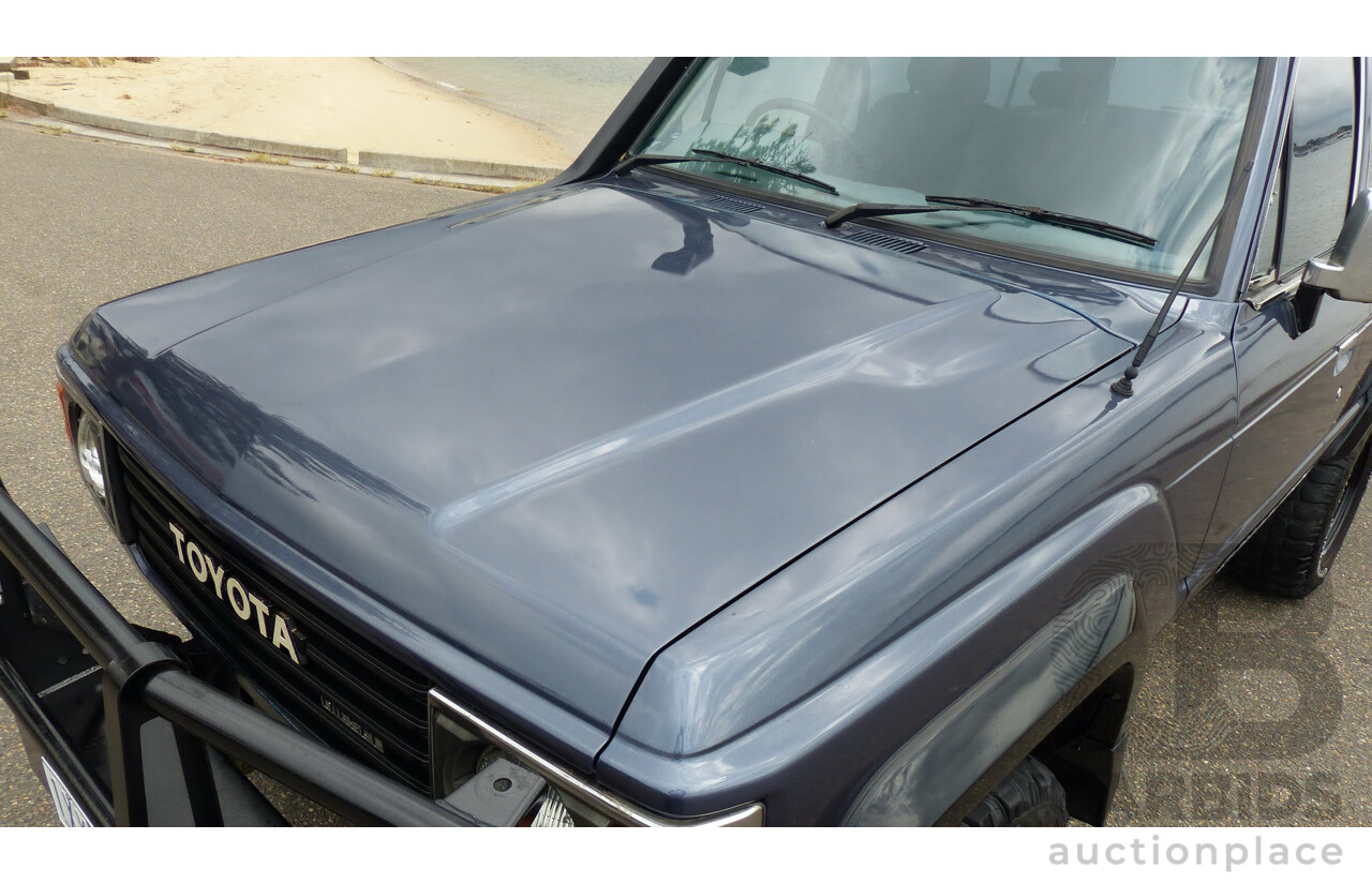 1/1986 Toyota Landcruiser Sahara (4x4) HJ61RG 4d Wagon Blue Diesel 4.0L