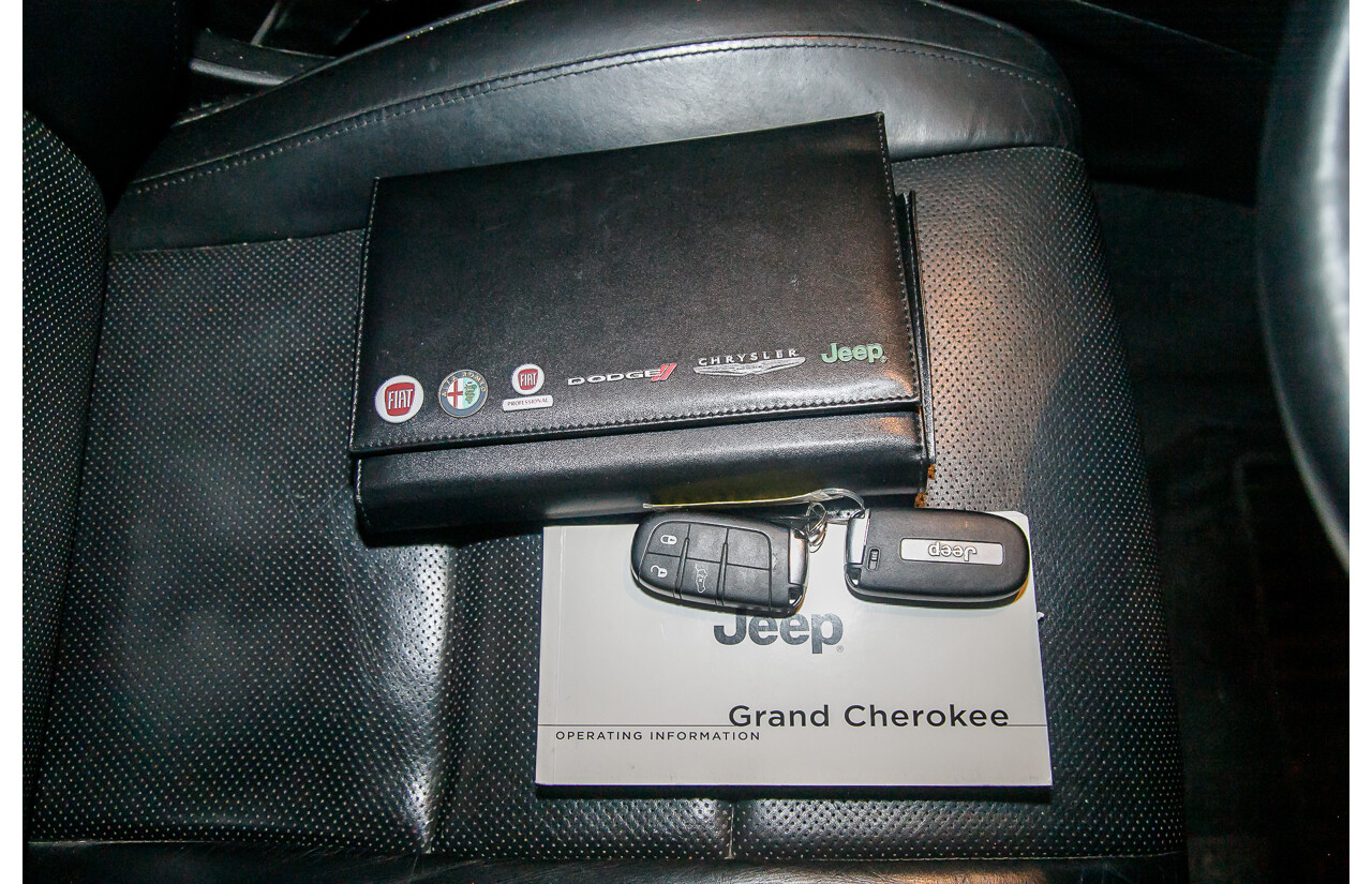 1/2014 Jeep Grand Cherokee Summit (4x4) WK MY14 4d Wagon White Turbo Diesel V6 3.0L