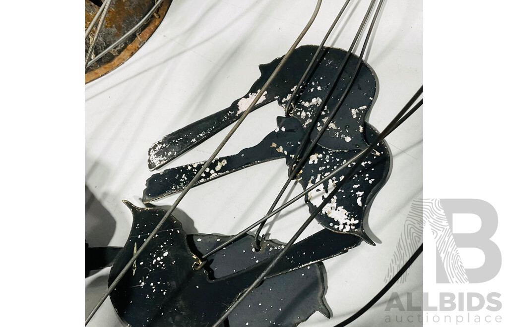 Collection of Vintage Outdoor Hangers Including Cast Iron Candle Holders, Cow Bell, Bird Feeder and Wind Chimes