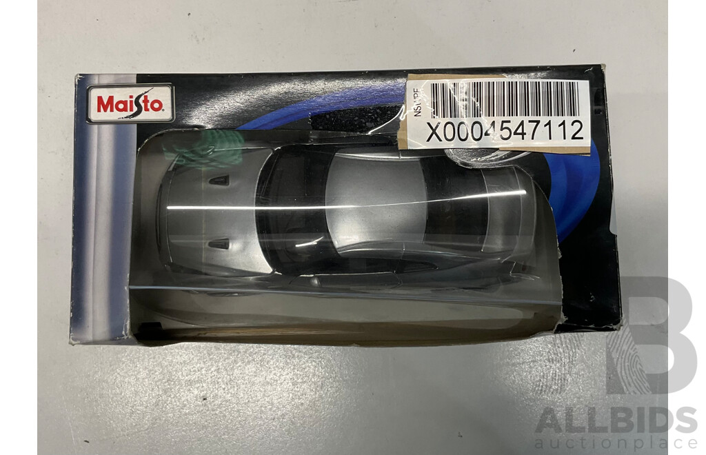 MAISTO 1:24 2009 Nissan GTR Model Car & MICHAEL JORDAN Collector Cards & Assorted of RASTAR R/C Cars - Lot of 4 - Estimated Total $200