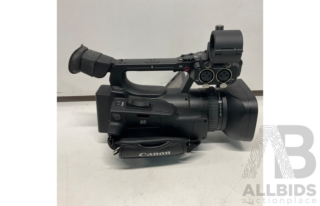 CANON XF100 Professional Digital Video Camera & NETGEAR Powerline AV Adapter with Ethernet Switch  & NEEWER Tripod - Lot of 3