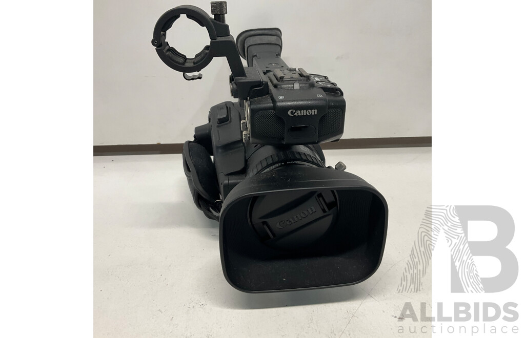 CANON XF100 Professional Digital Video Camera & NETGEAR Powerline AV Adapter with Ethernet Switch  & NEEWER Tripod - Lot of 3