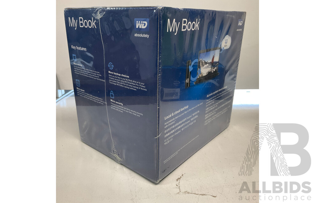 WD My Book Premium Storage 4TB & Essential External Hard Drive 1TB - Lot of 2 - Estimated Total ORP $500.00