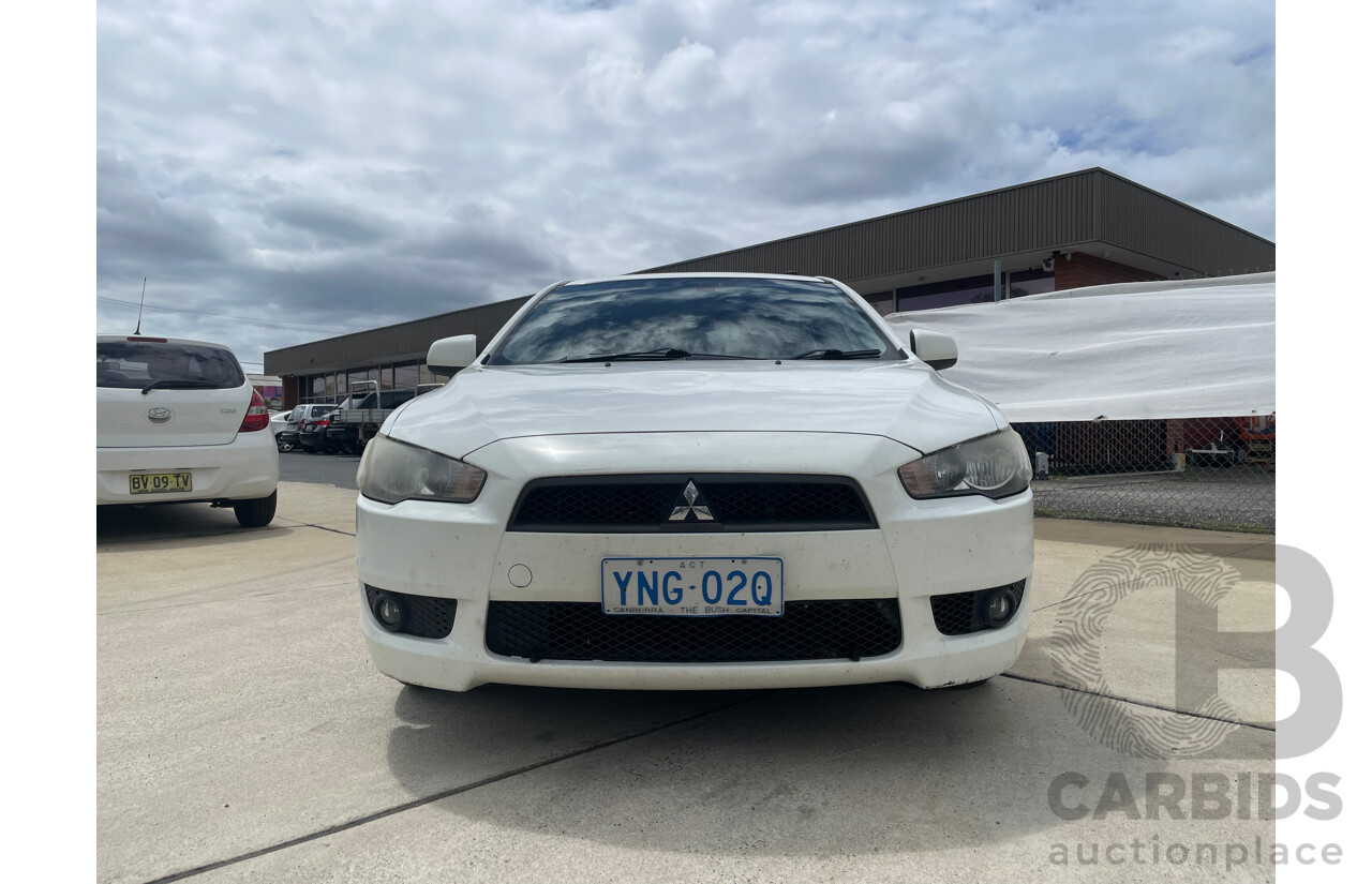 06/09 Mitsubishi Lancer SPORTBACK FWD CJ MY09 5D Hatchback White 2.0L