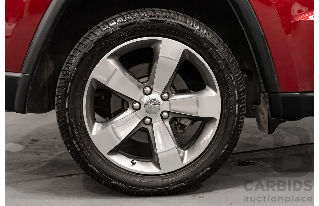 10/2013 Jeep Grand Cherokee Limited (4x4) WK MY14 4d Wagon Metallic Red Turbo Diesel V6 3.0L