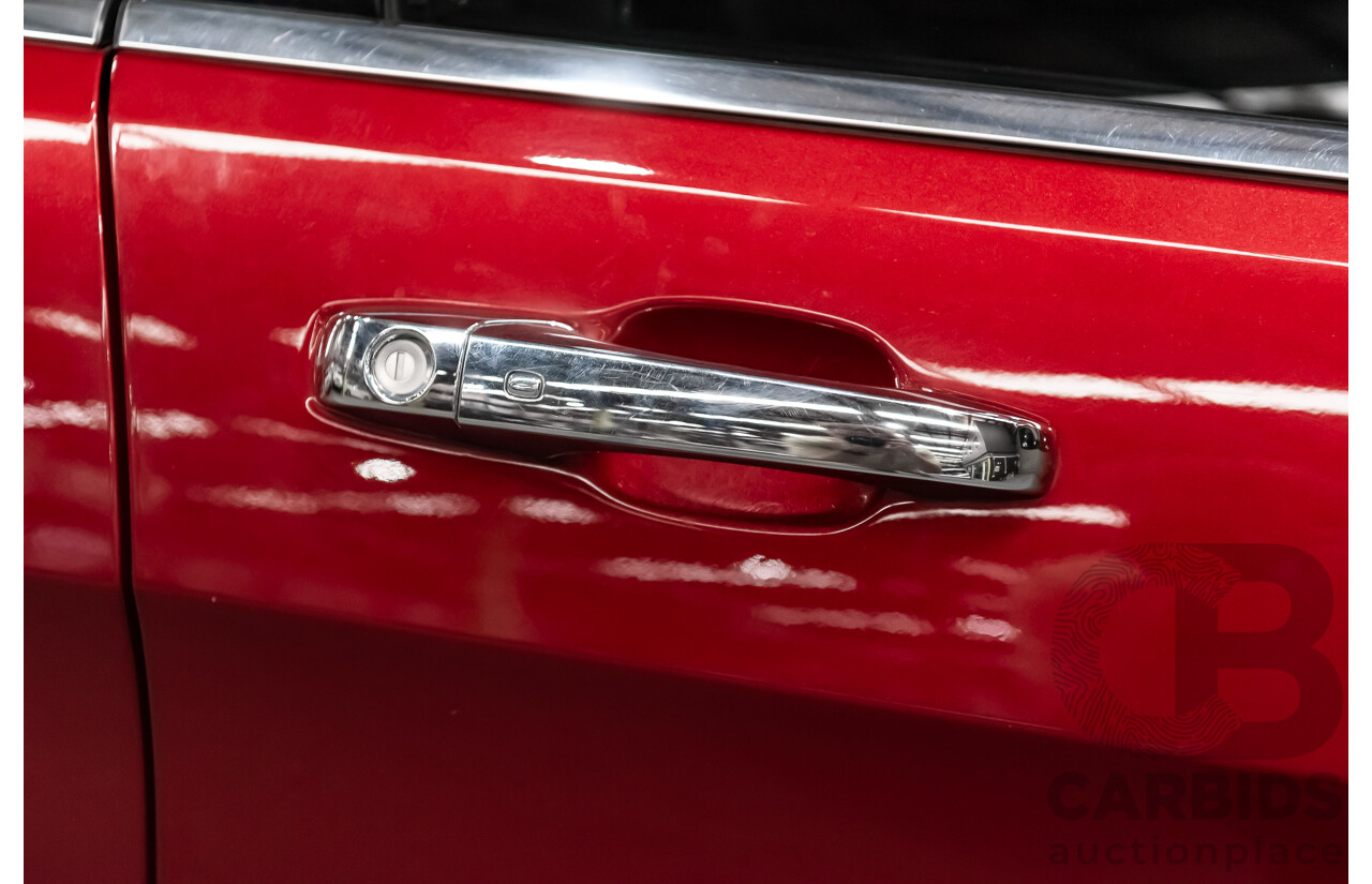 10/2013 Jeep Grand Cherokee Limited (4x4) WK MY14 4d Wagon Metallic Red Turbo Diesel V6 3.0L