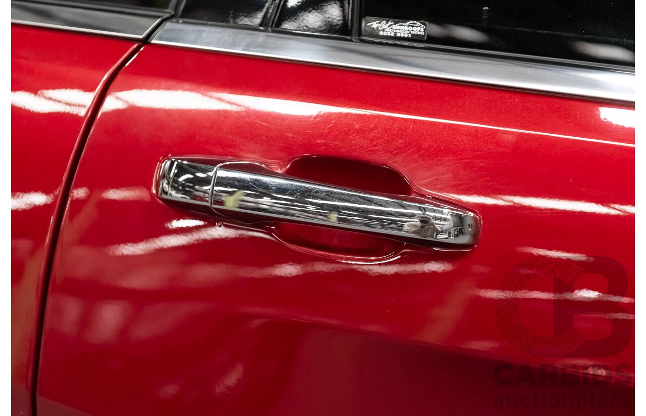 10/2013 Jeep Grand Cherokee Limited (4x4) WK MY14 4d Wagon Metallic Red Turbo Diesel V6 3.0L