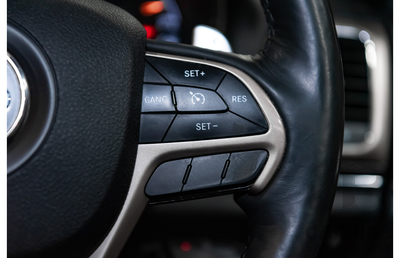 10/2013 Jeep Grand Cherokee Limited (4x4) WK MY14 4d Wagon Metallic Red Turbo Diesel V6 3.0L