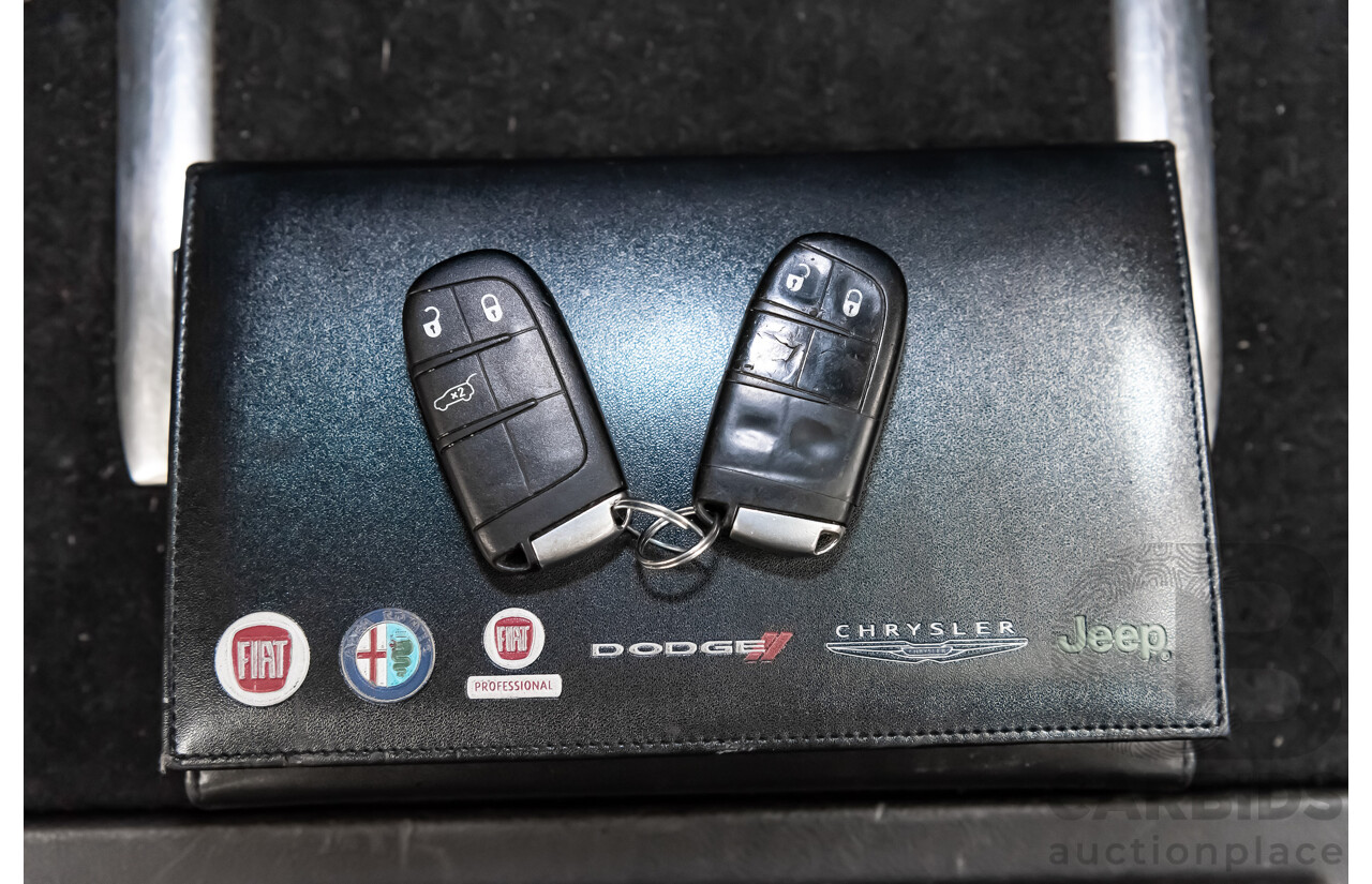 10/2013 Jeep Grand Cherokee Limited (4x4) WK MY14 4d Wagon Metallic Red Turbo Diesel V6 3.0L