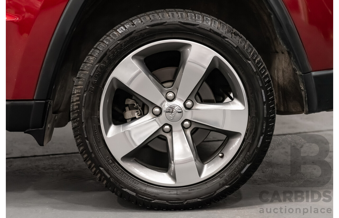 10/2013 Jeep Grand Cherokee Limited (4x4) WK MY14 4d Wagon Metallic Red Turbo Diesel V6 3.0L