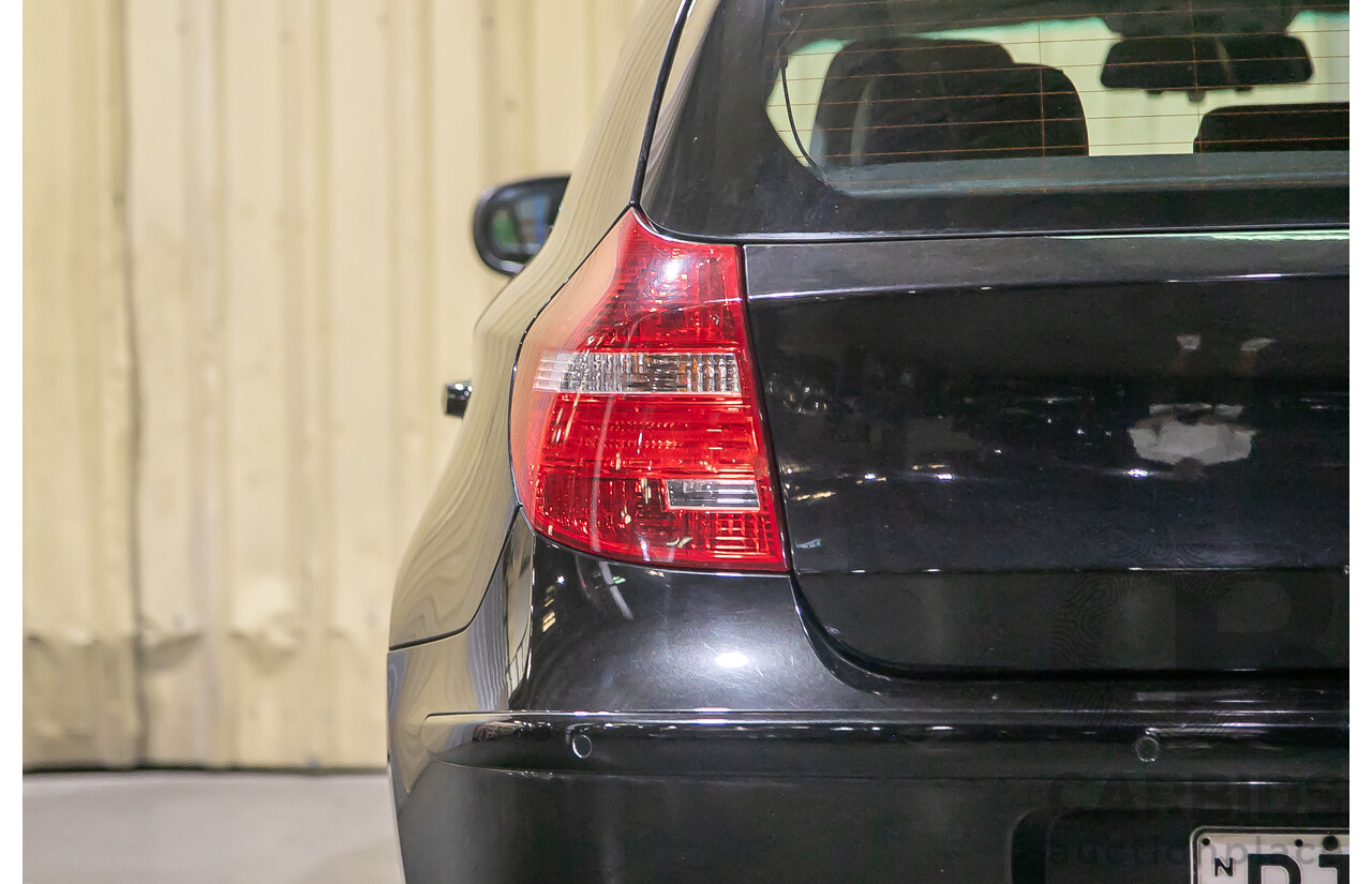 6/2010 BMW 118i E87 MY10 5d Hatchback Black 2.0L