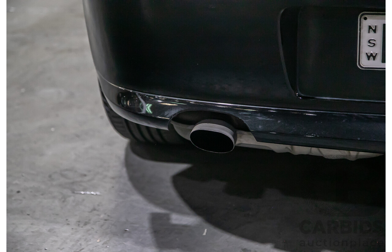 6/2010 BMW 118i E87 MY10 5d Hatchback Black 2.0L