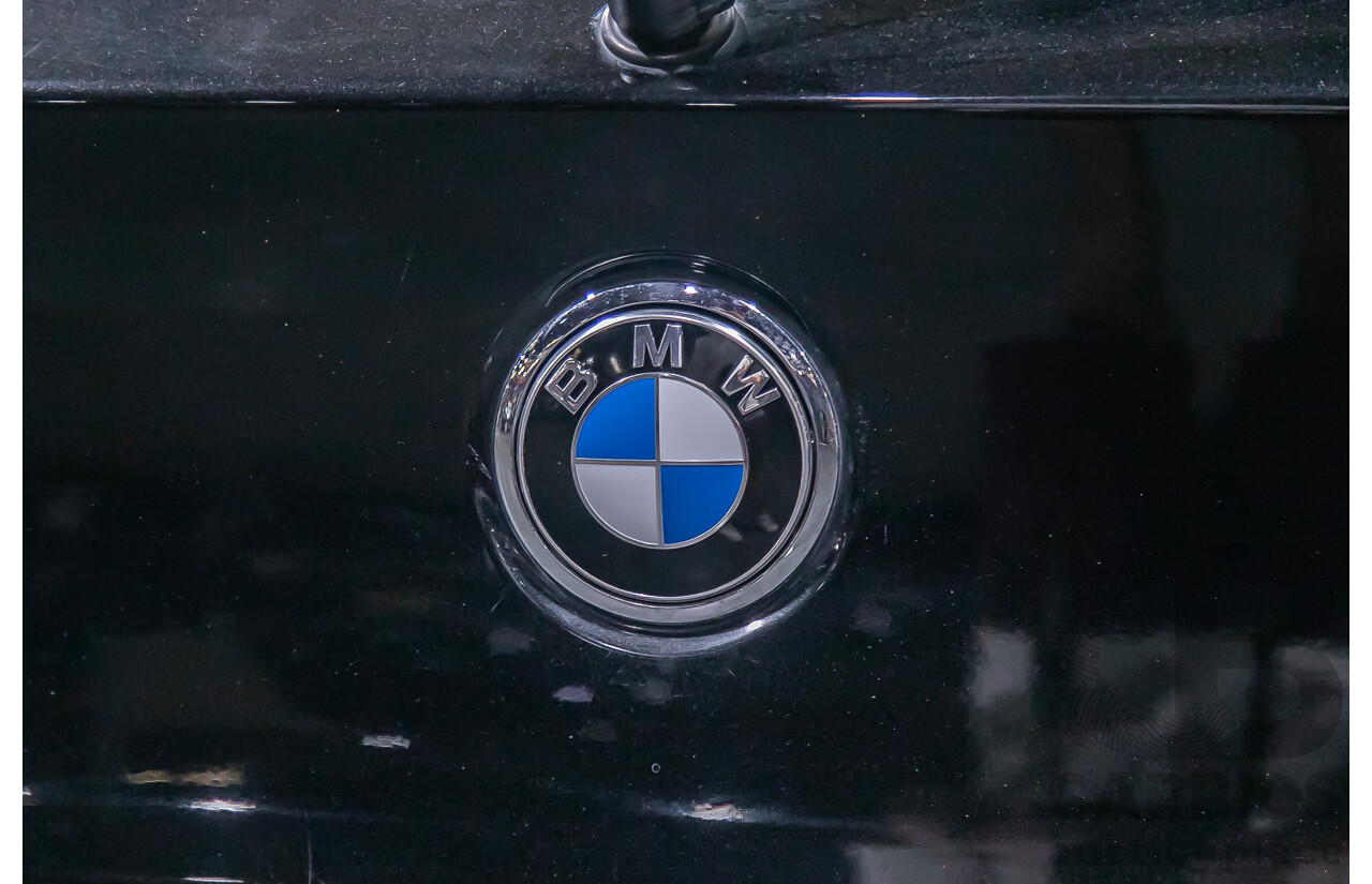 6/2010 BMW 118i E87 MY10 5d Hatchback Black 2.0L