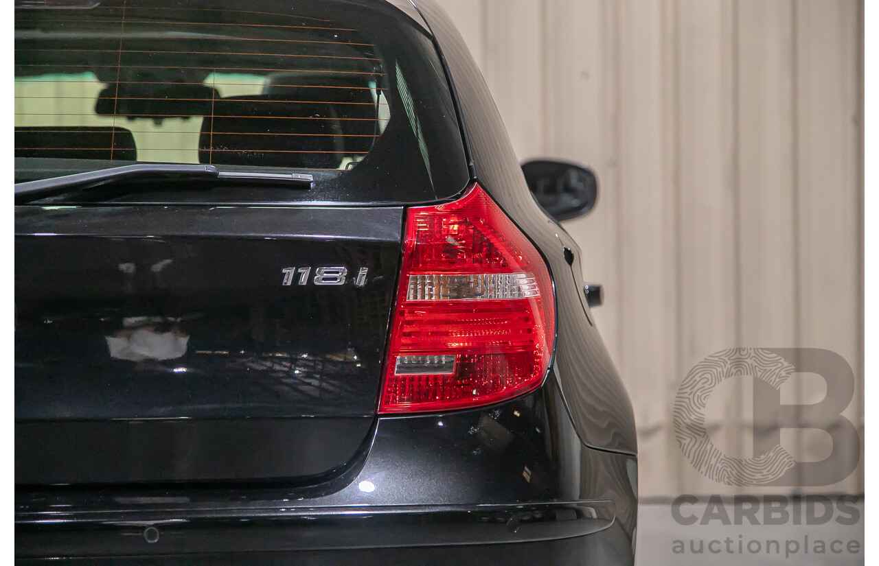 6/2010 BMW 118i E87 MY10 5d Hatchback Black 2.0L