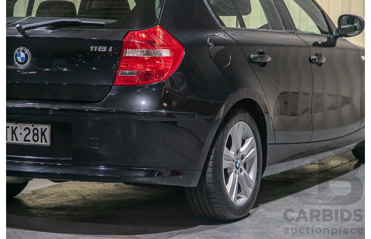 6/2010 BMW 118i E87 MY10 5d Hatchback Black 2.0L