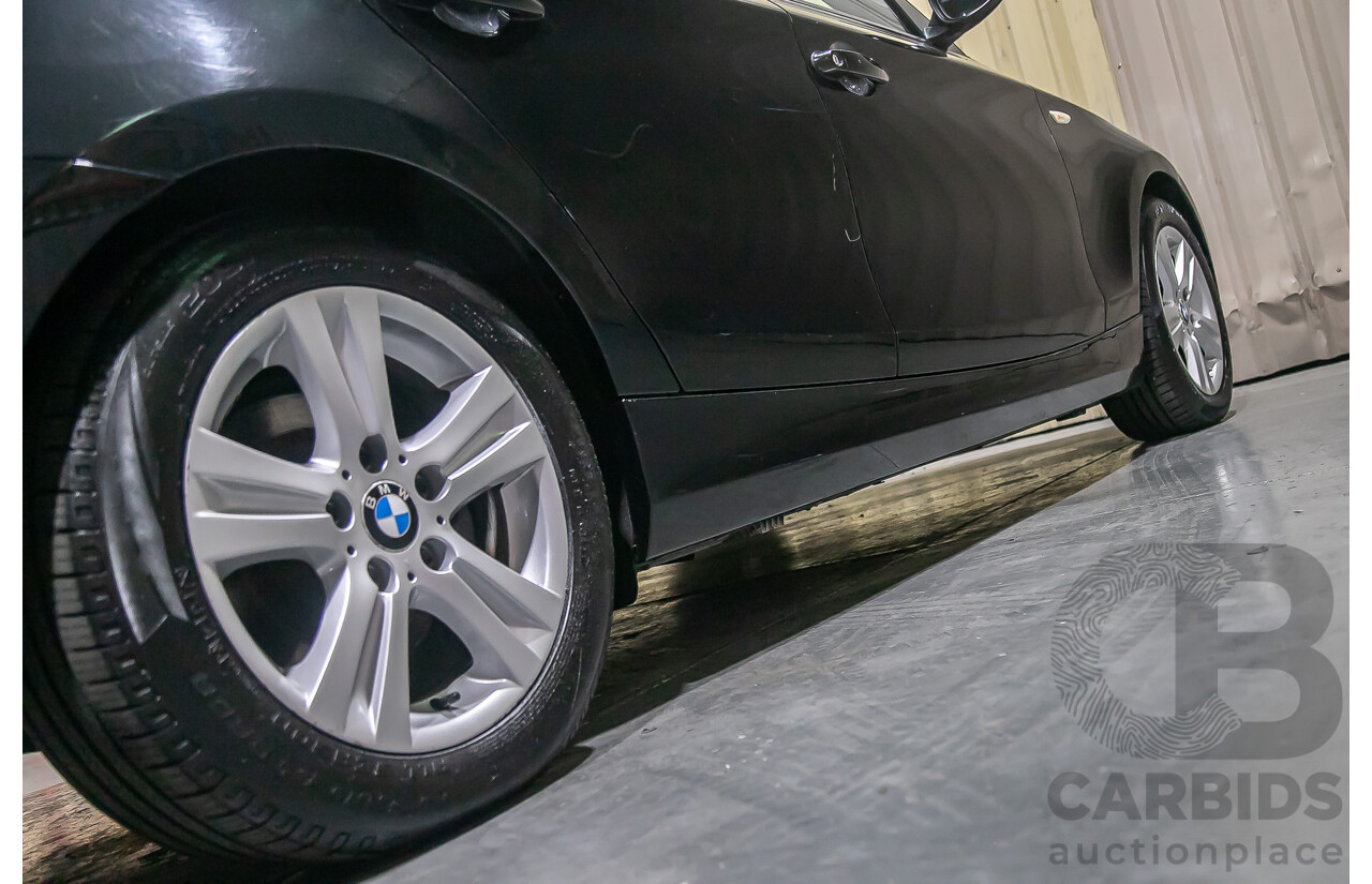 6/2010 BMW 118i E87 MY10 5d Hatchback Black 2.0L