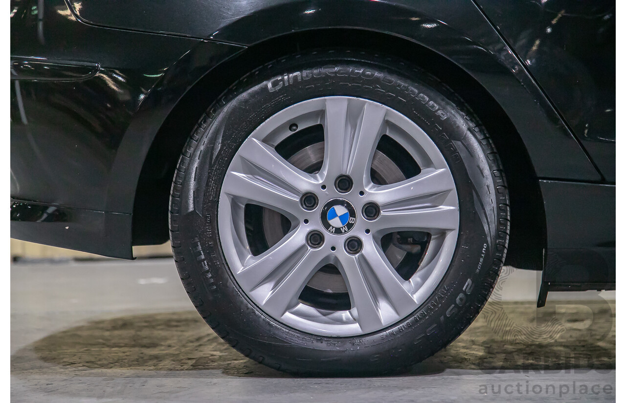 6/2010 BMW 118i E87 MY10 5d Hatchback Black 2.0L